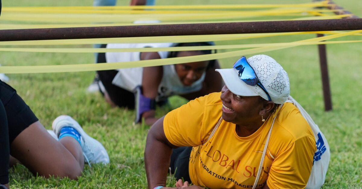 A team member takes on the limbo during the post-race activities