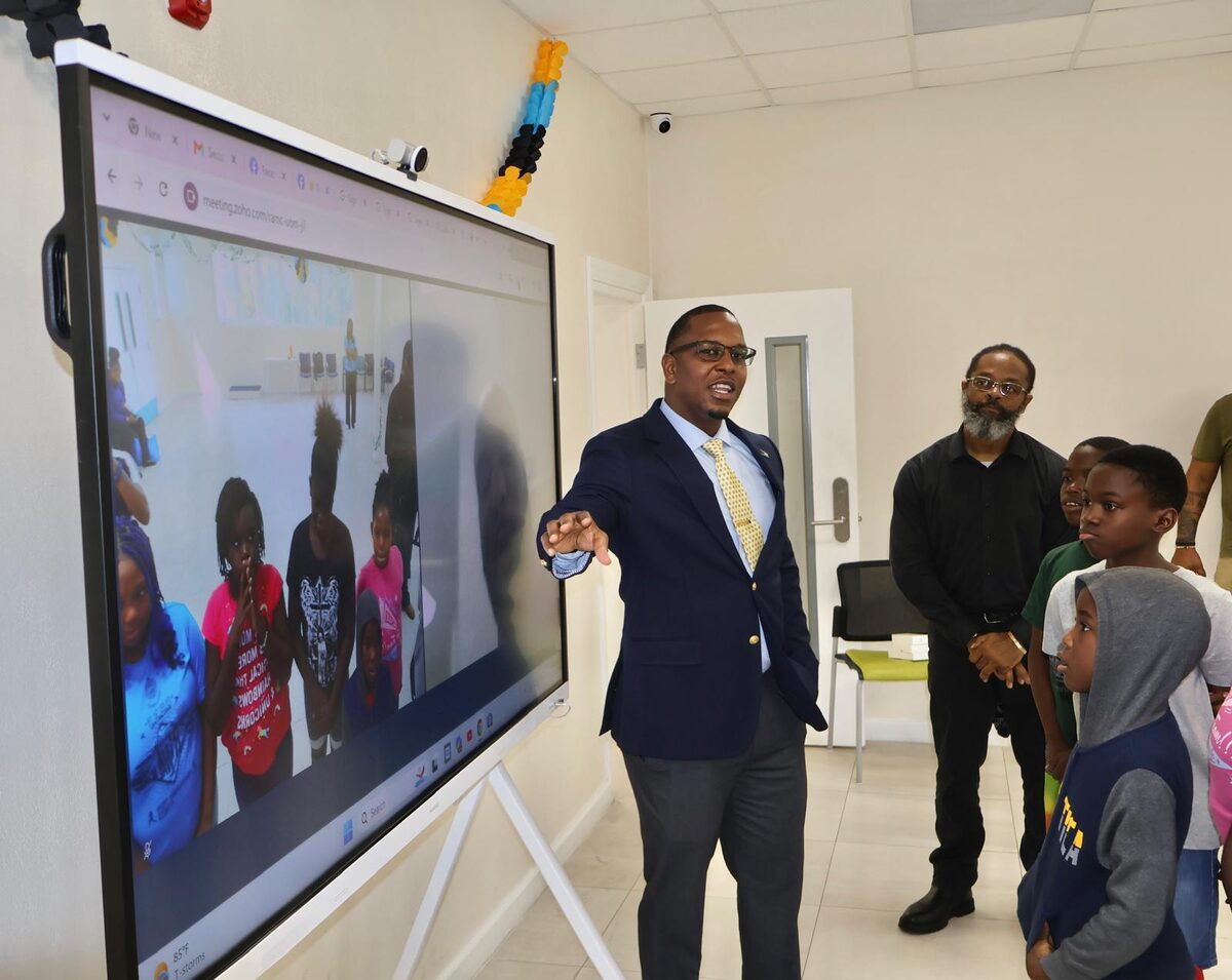 MP Jamahl Strachan addresses students during the smart board demonstration